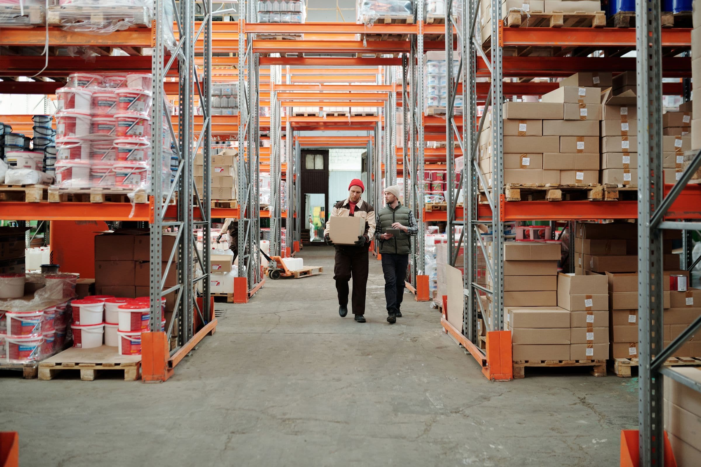 Warehouse staff in motion, picking orders during a shift